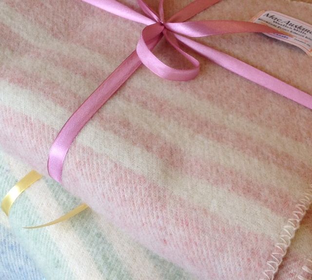 Our lap blankets in soft pastel colours make lovely baby gifts