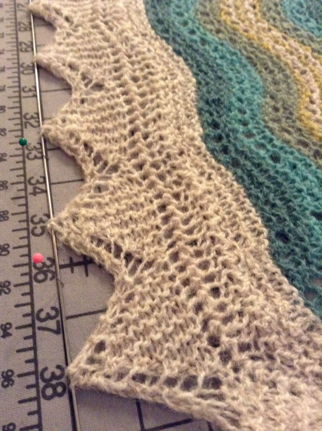 (5) Thread points of lace edging through blocking wire