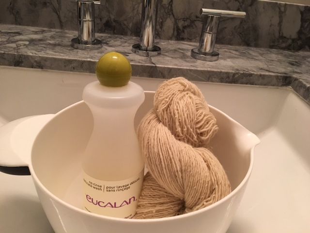 Gather supplies: &nbsp;Eucalan wool wash, bowl or basin, tepid water, skeined yarn and a towel