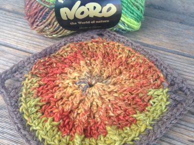 Sunny Spread Square in Noro Kureyon and Cascade Eco Wool